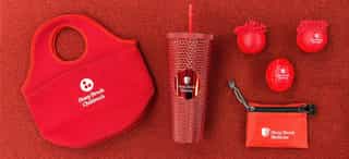 Stony Brook Medicine branded merchandise including t-shirts, tumbler, and activewear.