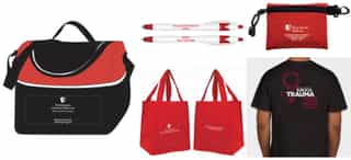 Stony Brook Medicine branded merchandise including t-shirts, tote bags, and pens.